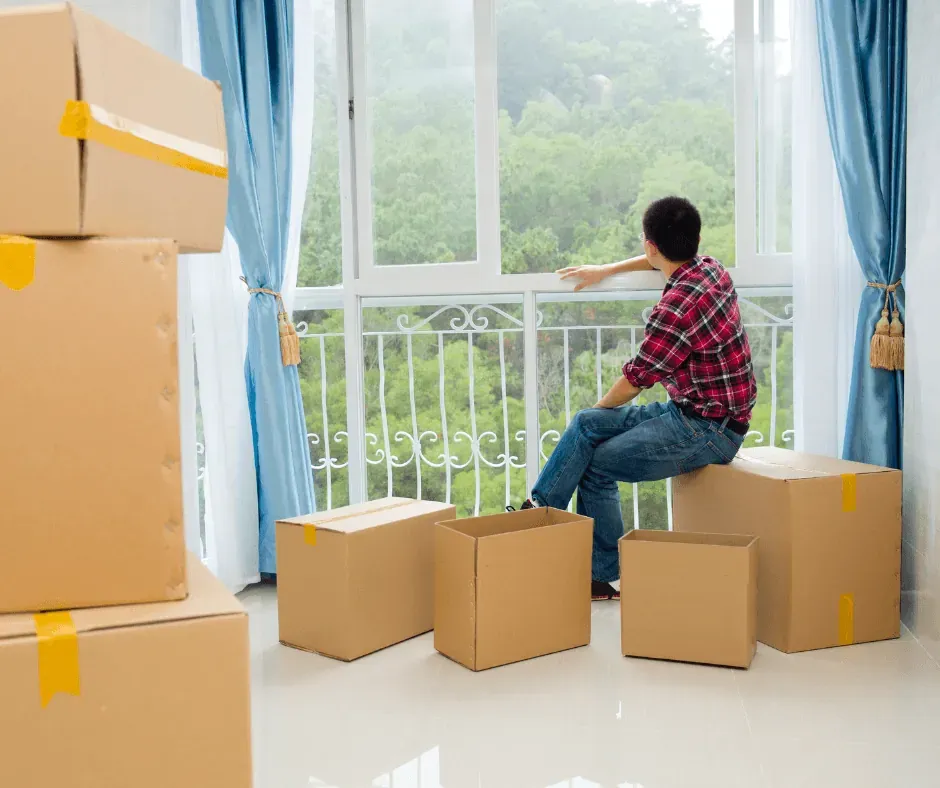 Packing for a move, waiting to move, boxes, tape, packing, moving, new home